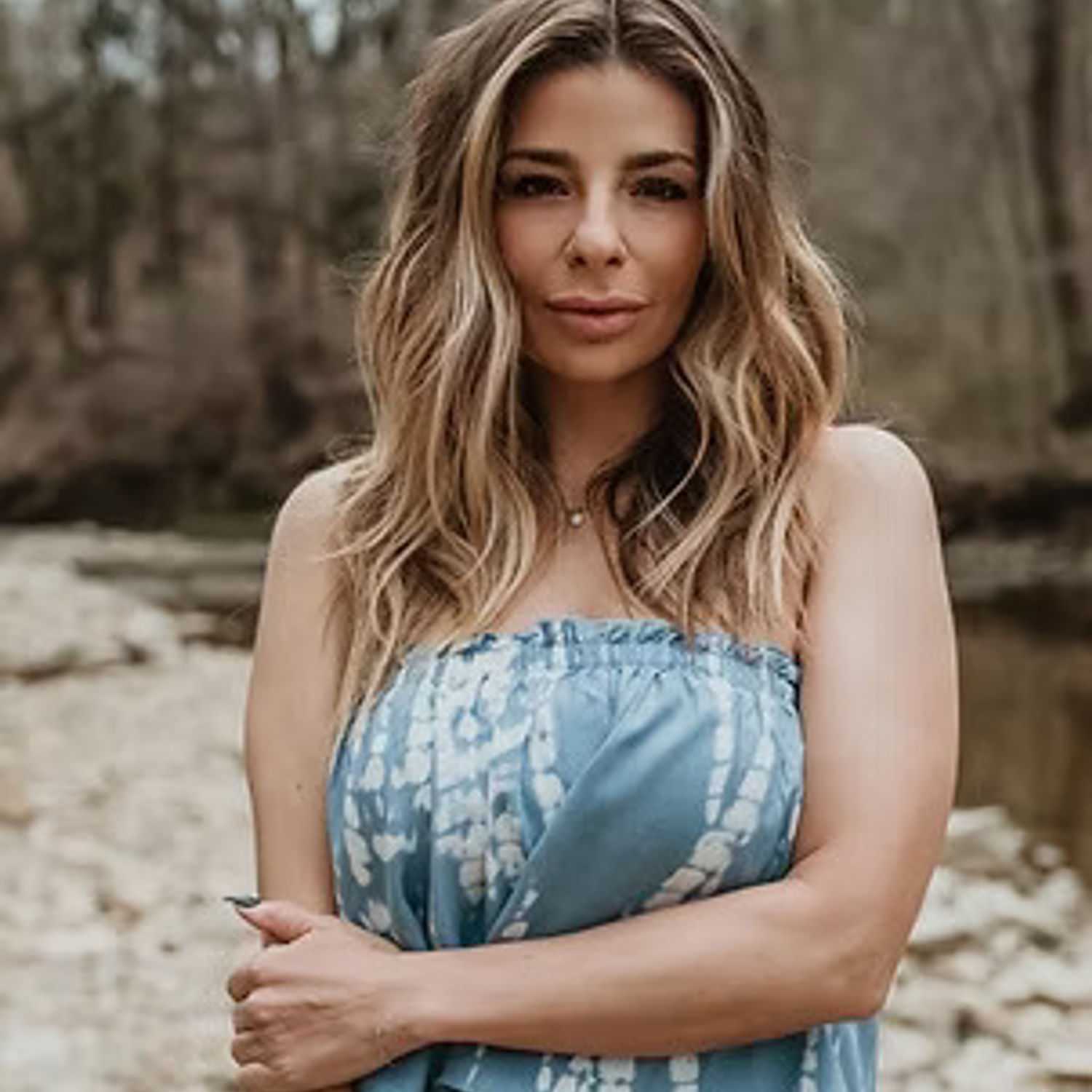 Portrait of Lauren Tomasino, a professional stylist at Salon Stone & Spa, showcasing their expertise and style.