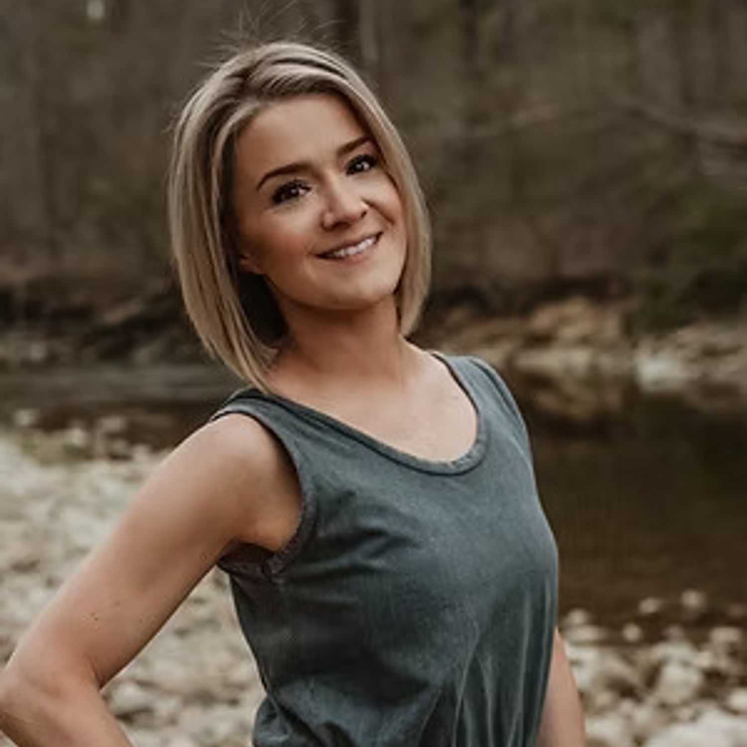 Portrait of Brit Stoneback, a professional stylist at Salon Stone & Spa, showcasing their expertise and style.