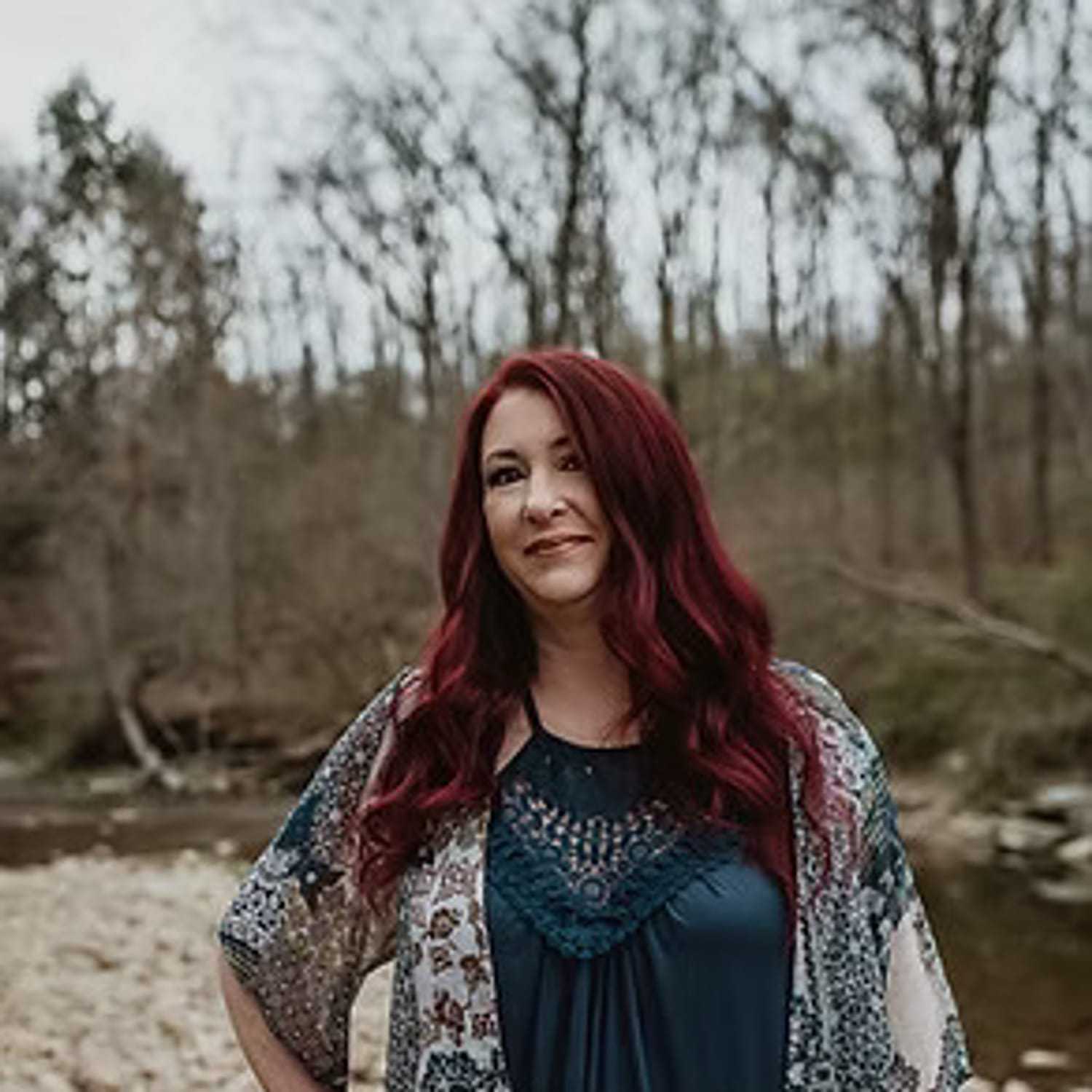 Portrait of Laura Davis, a professional stylist at Salon Stone & Spa, showcasing their expertise and style.