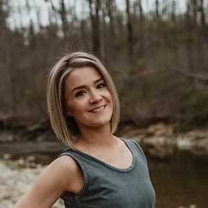 Portrait of Brit Stoneback, a professional stylist at Salon Stone & Spa, showcasing their expertise and style.