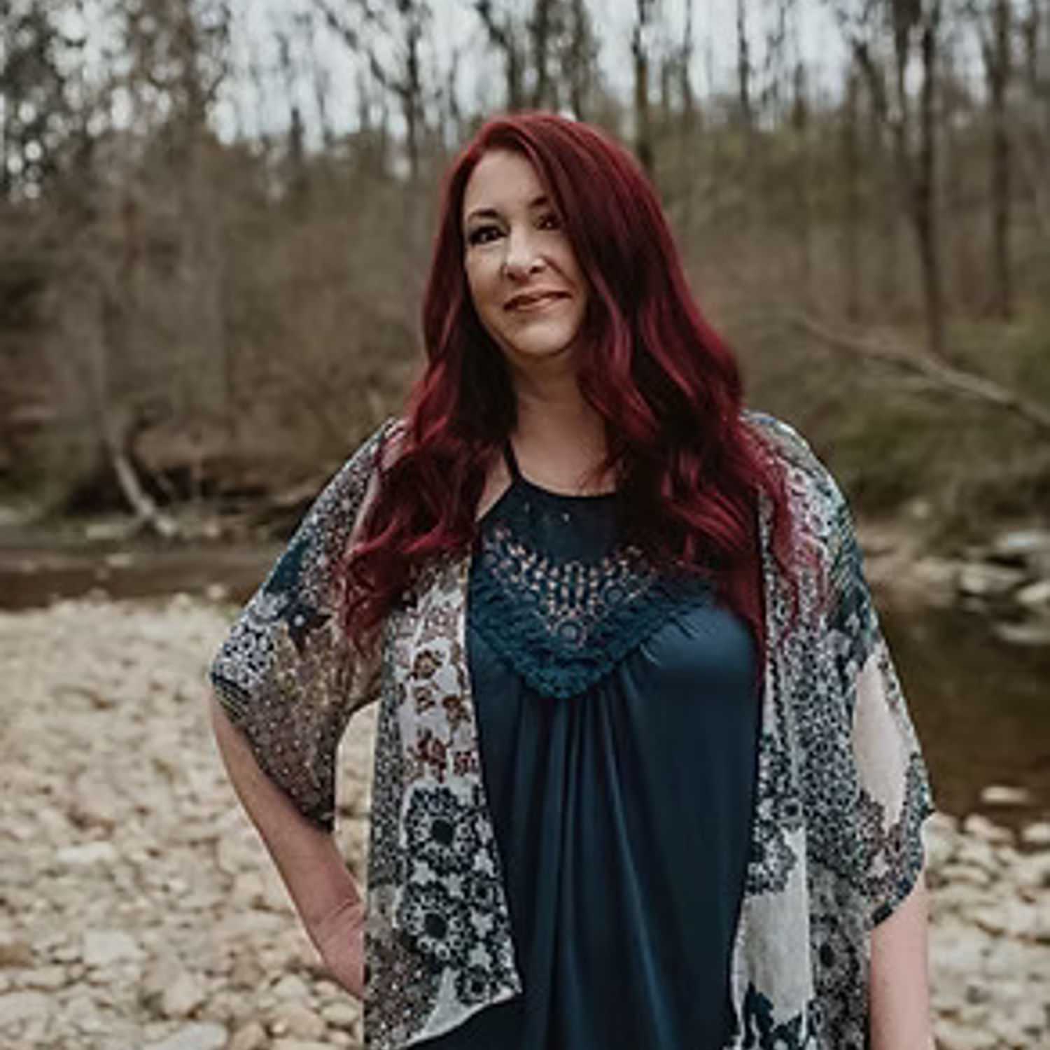 Portrait of Laura Davis, a professional stylist at Salon Stone & Spa, showcasing their expertise and style.