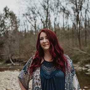 Portrait of Laura Davis, a professional stylist at Salon Stone & Spa, showcasing their expertise and style.